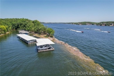 Nestled in the coveted Black Hawk Estates on a scenic bluff with on Seasons Ridge At Four Seasons in Missouri - for sale on GolfHomes.com, golf home, golf lot