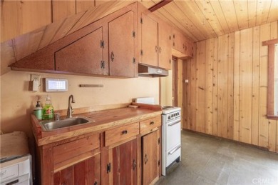 Nestled on a spacious 5,000 square foot lot, this 2-bedroom on Big Bear Mountain Ski and Golf Resort in California - for sale on GolfHomes.com, golf home, golf lot