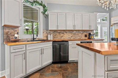You'll be captivated by the custom craftsmanship  elegant design on The Club At Old Kinderhook in Missouri - for sale on GolfHomes.com, golf home, golf lot