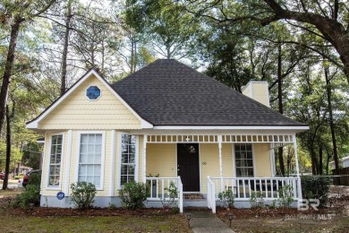 Full of southern charm, this beautiful 3-bedroom, 2-bath cottage on Lake Forest Yacht and Country Club in Alabama - for sale on GolfHomes.com, golf home, golf lot
