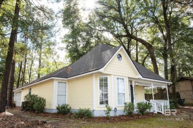 Full of southern charm, this beautiful 3-bedroom, 2-bath cottage on Lake Forest Yacht and Country Club in Alabama - for sale on GolfHomes.com, golf home, golf lot