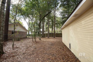 Full of southern charm, this beautiful 3-bedroom, 2-bath cottage on Lake Forest Yacht and Country Club in Alabama - for sale on GolfHomes.com, golf home, golf lot