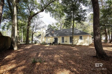 Full of southern charm, this beautiful 3-bedroom, 2-bath cottage on Lake Forest Yacht and Country Club in Alabama - for sale on GolfHomes.com, golf home, golf lot