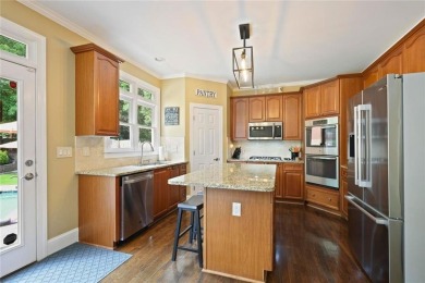 This beautiful 5-bedroom, 4-bathroom home in the highly on Brookstone Golf and Country Club in Georgia - for sale on GolfHomes.com, golf home, golf lot