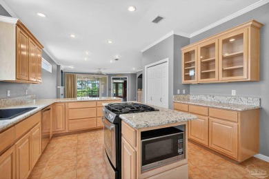 Charming Golf Course Community Home with Canal Views in Tiger on Tiger Point Golf and Country Club in Florida - for sale on GolfHomes.com, golf home, golf lot