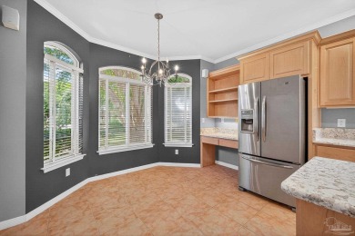 Charming Golf Course Community Home with Canal Views in Tiger on Tiger Point Golf and Country Club in Florida - for sale on GolfHomes.com, golf home, golf lot