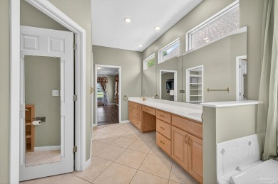 Charming Golf Course Community Home with Canal Views in Tiger on Tiger Point Golf and Country Club in Florida - for sale on GolfHomes.com, golf home, golf lot