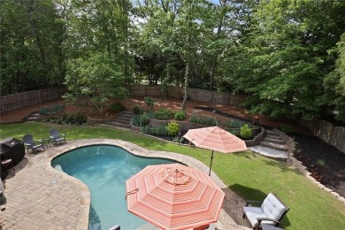 This beautiful 5-bedroom, 4-bathroom home in the highly on Brookstone Golf and Country Club in Georgia - for sale on GolfHomes.com, golf home, golf lot