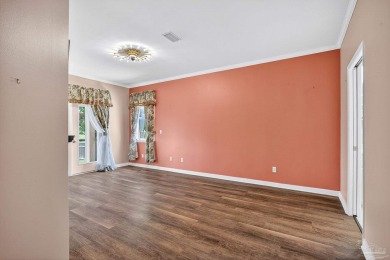 Charming Golf Course Community Home with Canal Views in Tiger on Tiger Point Golf and Country Club in Florida - for sale on GolfHomes.com, golf home, golf lot
