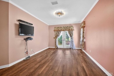 Charming Golf Course Community Home with Canal Views in Tiger on Tiger Point Golf and Country Club in Florida - for sale on GolfHomes.com, golf home, golf lot