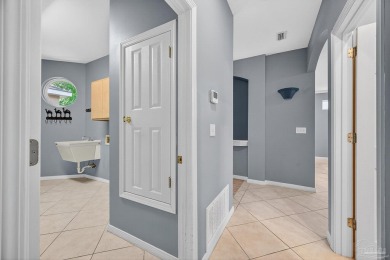 Charming Golf Course Community Home with Canal Views in Tiger on Tiger Point Golf and Country Club in Florida - for sale on GolfHomes.com, golf home, golf lot