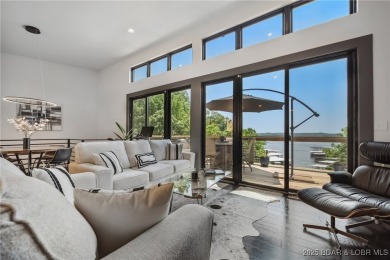 The views from this modernly constructed lakefront home are on Seasons Ridge At Four Seasons in Missouri - for sale on GolfHomes.com, golf home, golf lot