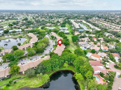 Light and bright second floor unit overlooking the golf course on Boca Delray Golf and Country Club in Florida - for sale on GolfHomes.com, golf home, golf lot