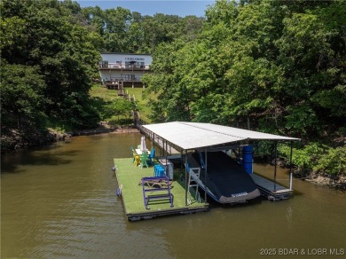 The views from this modernly constructed lakefront home are on Seasons Ridge At Four Seasons in Missouri - for sale on GolfHomes.com, golf home, golf lot