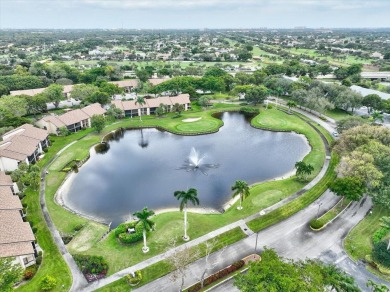 Light and bright second floor unit overlooking the golf course on Boca Delray Golf and Country Club in Florida - for sale on GolfHomes.com, golf home, golf lot