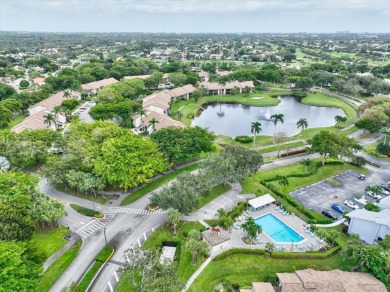 Light and bright second floor unit overlooking the golf course on Boca Delray Golf and Country Club in Florida - for sale on GolfHomes.com, golf home, golf lot