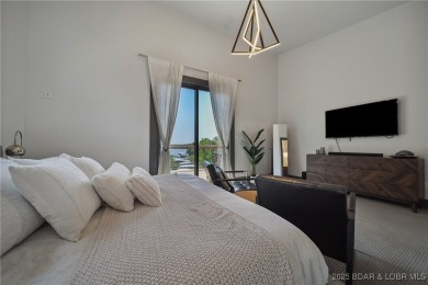 The views from this modernly constructed lakefront home are on Seasons Ridge At Four Seasons in Missouri - for sale on GolfHomes.com, golf home, golf lot