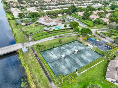 Light and bright second floor unit overlooking the golf course on Boca Delray Golf and Country Club in Florida - for sale on GolfHomes.com, golf home, golf lot