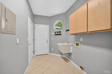 Charming Golf Course Community Home with Canal Views in Tiger on Tiger Point Golf and Country Club in Florida - for sale on GolfHomes.com, golf home, golf lot