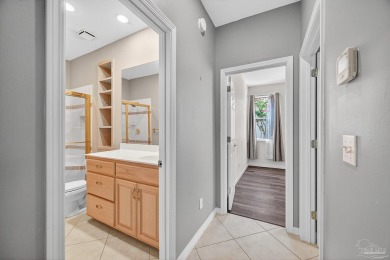 Charming Golf Course Community Home with Canal Views in Tiger on Tiger Point Golf and Country Club in Florida - for sale on GolfHomes.com, golf home, golf lot