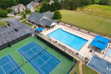 This beautiful 5-bedroom, 4-bathroom home in the highly on Brookstone Golf and Country Club in Georgia - for sale on GolfHomes.com, golf home, golf lot