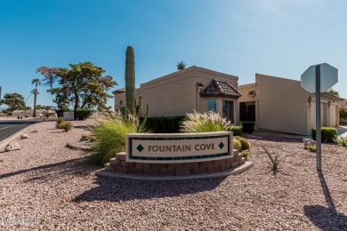 Location!  Lovely end unit with view of golf course and minutes on Fountain of the Sun Country Club in Arizona - for sale on GolfHomes.com, golf home, golf lot