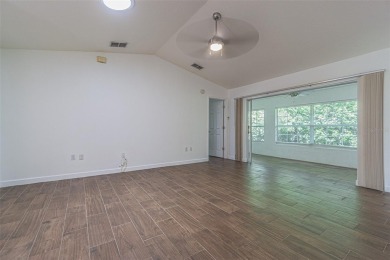 MOVE RIGHT IN and enjoy this 55+ guard-gated community of Tampa on Tampa Bay Golf and Country Club in Florida - for sale on GolfHomes.com, golf home, golf lot