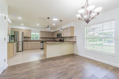 MOVE RIGHT IN and enjoy this 55+ guard-gated community of Tampa on Tampa Bay Golf and Country Club in Florida - for sale on GolfHomes.com, golf home, golf lot