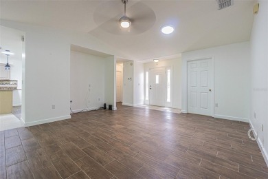 MOVE RIGHT IN and enjoy this 55+ guard-gated community of Tampa on Tampa Bay Golf and Country Club in Florida - for sale on GolfHomes.com, golf home, golf lot