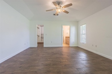 MOVE RIGHT IN and enjoy this 55+ guard-gated community of Tampa on Tampa Bay Golf and Country Club in Florida - for sale on GolfHomes.com, golf home, golf lot