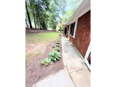 Charming Mid-Century Modern Ranch on a Quiet Corner Lot! Welcome on Fairfield Plantation Golf and Country Club in Georgia - for sale on GolfHomes.com, golf home, golf lot