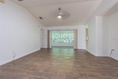 MOVE RIGHT IN and enjoy this 55+ guard-gated community of Tampa on Tampa Bay Golf and Country Club in Florida - for sale on GolfHomes.com, golf home, golf lot