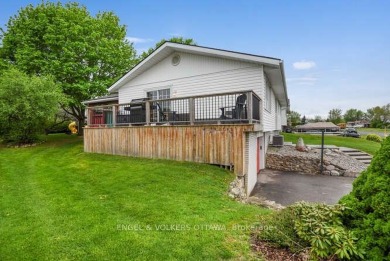 Charming side-split home on an oversized lot, ideally located on Dundas Valley Golf and Curling Club in  - for sale on GolfHomes.com, golf home, golf lot