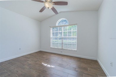 MOVE RIGHT IN and enjoy this 55+ guard-gated community of Tampa on Tampa Bay Golf and Country Club in Florida - for sale on GolfHomes.com, golf home, golf lot