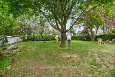 Charming side-split home on an oversized lot, ideally located on Dundas Valley Golf and Curling Club in  - for sale on GolfHomes.com, golf home, golf lot