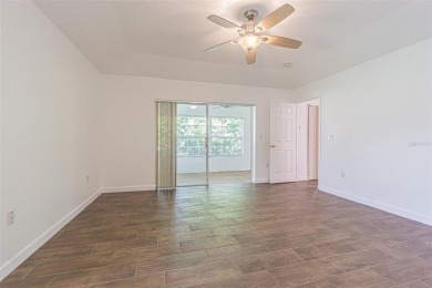 MOVE RIGHT IN and enjoy this 55+ guard-gated community of Tampa on Tampa Bay Golf and Country Club in Florida - for sale on GolfHomes.com, golf home, golf lot
