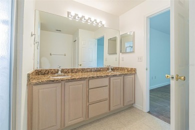 MOVE RIGHT IN and enjoy this 55+ guard-gated community of Tampa on Tampa Bay Golf and Country Club in Florida - for sale on GolfHomes.com, golf home, golf lot