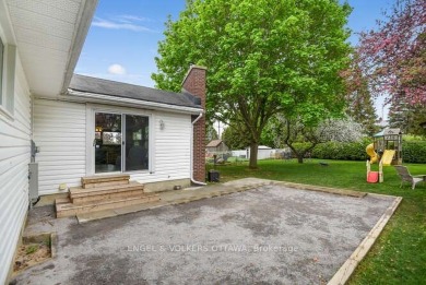 Charming side-split home on an oversized lot, ideally located on Dundas Valley Golf and Curling Club in  - for sale on GolfHomes.com, golf home, golf lot