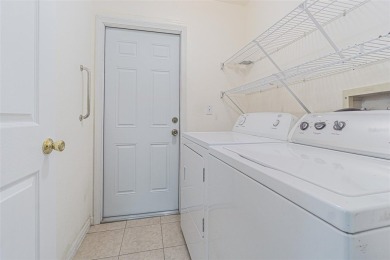 MOVE RIGHT IN and enjoy this 55+ guard-gated community of Tampa on Tampa Bay Golf and Country Club in Florida - for sale on GolfHomes.com, golf home, golf lot