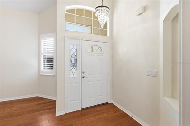 Located within the guard-gated River Hills Golf & Country Club on River Hills Country Club in Florida - for sale on GolfHomes.com, golf home, golf lot