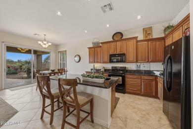 A relaxing retreat in the gated Estrella Fairways, surrounded by on Estrella Mountain Ranch Golf Course in Arizona - for sale on GolfHomes.com, golf home, golf lot