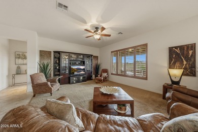 A relaxing retreat in the gated Estrella Fairways, surrounded by on Estrella Mountain Ranch Golf Course in Arizona - for sale on GolfHomes.com, golf home, golf lot