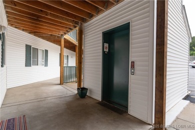 Welcome to your lakefront dream retreat! This immaculate on The Club At Old Kinderhook in Missouri - for sale on GolfHomes.com, golf home, golf lot