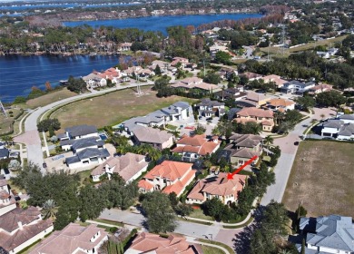 Nestled in the exclusive 24-hour guard-gated community of on Arnold Palmers Bay Hill Club and Lodge  in Florida - for sale on GolfHomes.com, golf home, golf lot