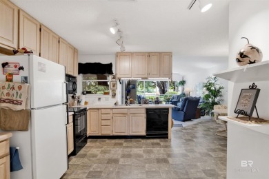 Nestled among gorgeous mature trees, this spacious 2,200 sq ft on The Golf Club of the Wharf in Alabama - for sale on GolfHomes.com, golf home, golf lot