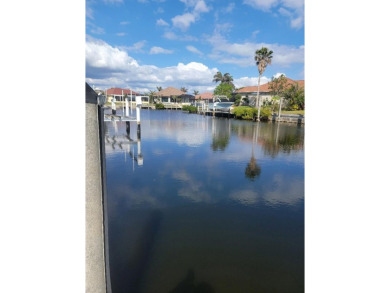 If you like living in a boating community then Punta Gorda Isles on Saint Andrews South Golf Club in Florida - for sale on GolfHomes.com, golf home, golf lot