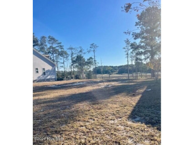 Discover the perfect homesite in Carolina Place, offering on South Harbour Golf Links in North Carolina - for sale on GolfHomes.com, golf home, golf lot