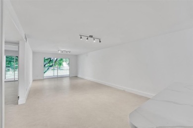 Welcome to this beautifully renovated 2-bedroom 2-bathroom condo on Wynmoor Golf Course in Florida - for sale on GolfHomes.com, golf home, golf lot