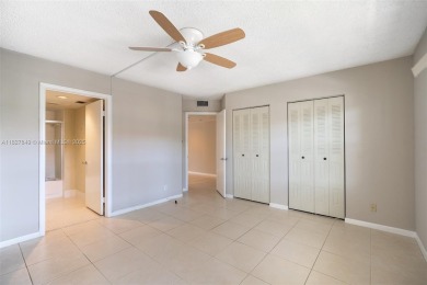 Welcome to resort stye living in Century Village! This 1 Bed/ 1 on Flamingo Lakes Country Club in Florida - for sale on GolfHomes.com, golf home, golf lot