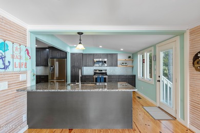 Location, Location, Location! This charming coastal cottage is on Founders Club At St. James Plantation in North Carolina - for sale on GolfHomes.com, golf home, golf lot